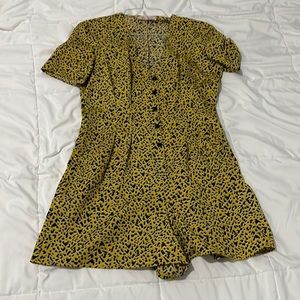 BCBG yellow and black romper. Size small.